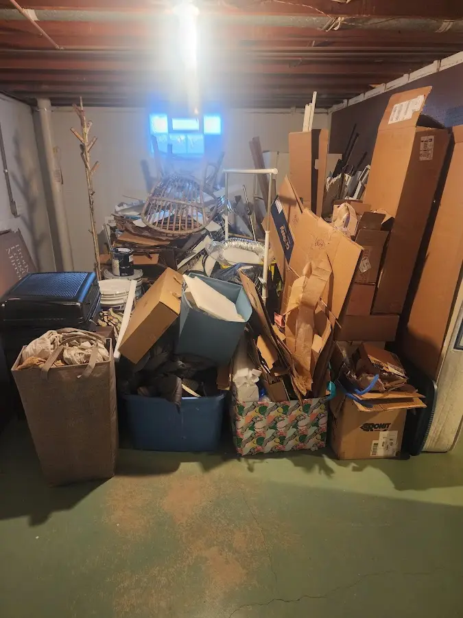 Roll-off dumpster container at job site for 2 Yard Dumpster Rental in Hillside